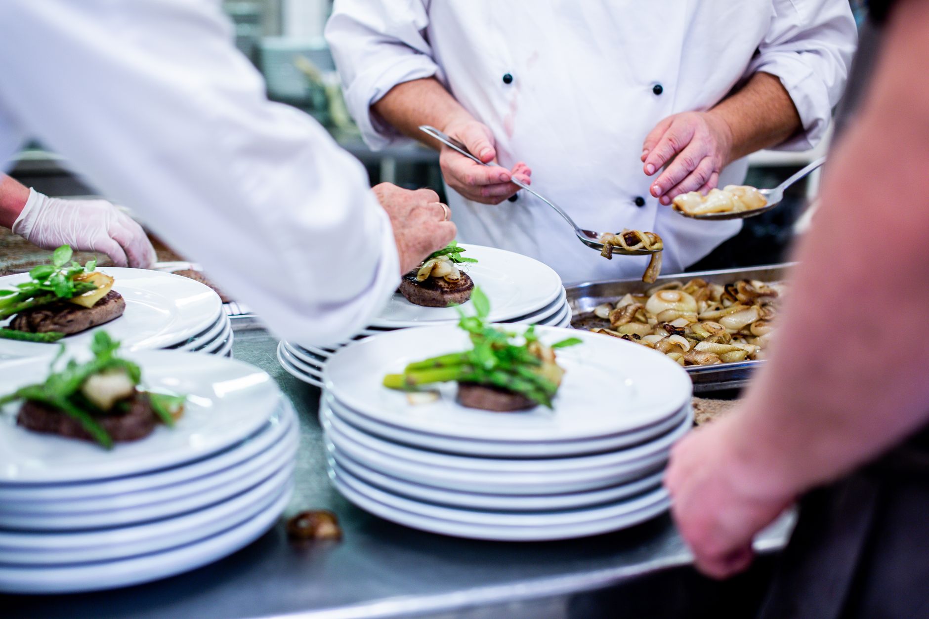 Chef preparing food for a catered event
