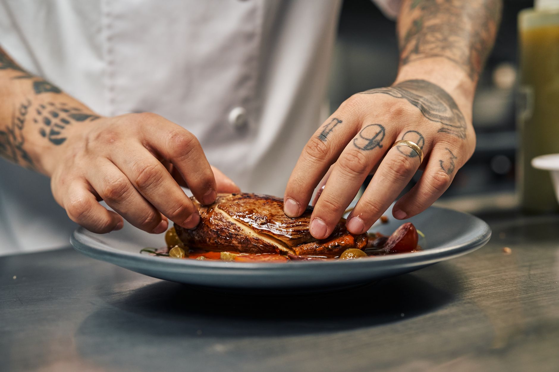 Server bringing food to guests